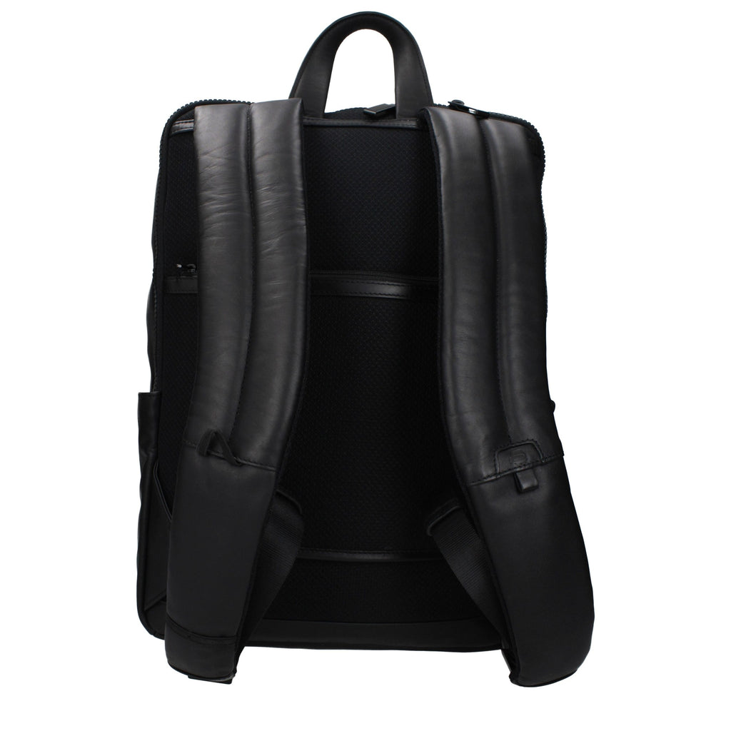 Black leather backpack by Piquadro featuring sleek design, sturdy straps, and multiple compartments for everyday use.
