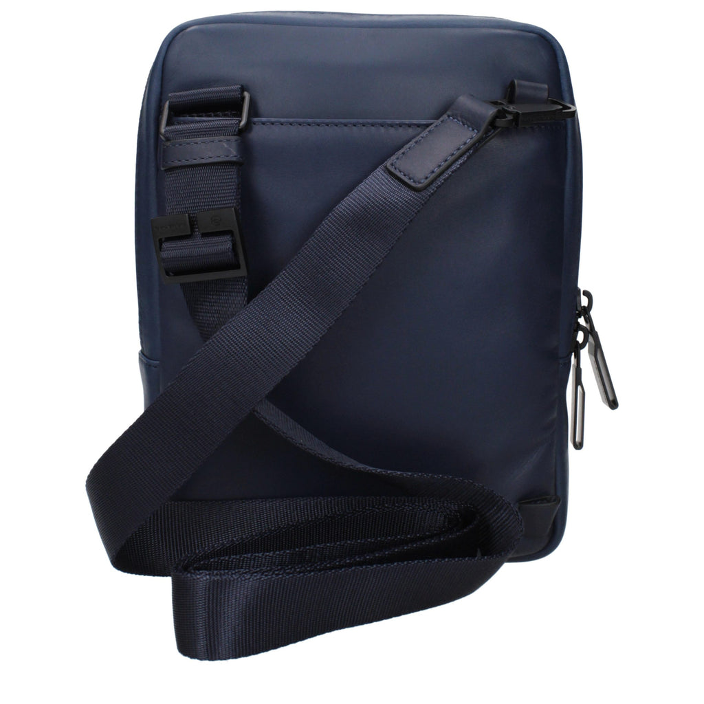 Piquadro blue leather crossbody bag with adjustable strap and sleek design, perfect for stylish everyday use.