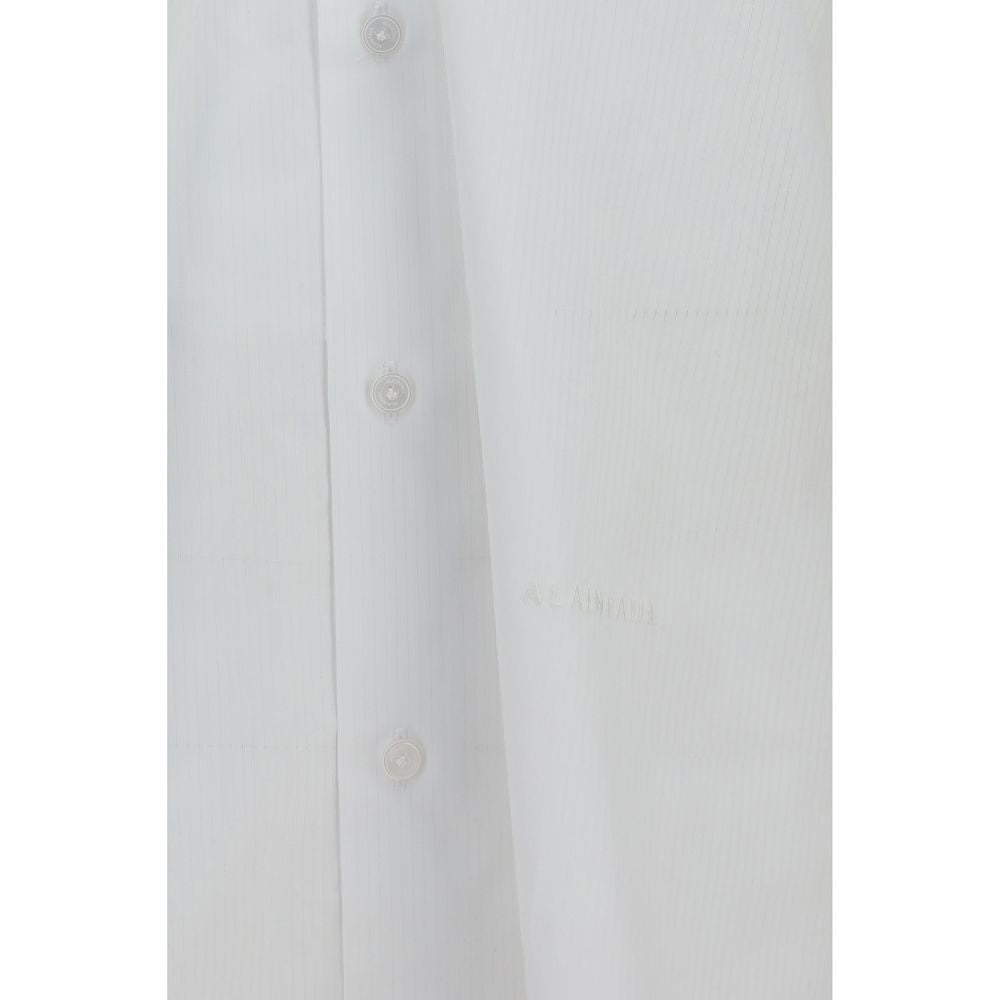 AlainPaul white cotton shirt with a classic collar and button-down front, displayed on a mannequin.