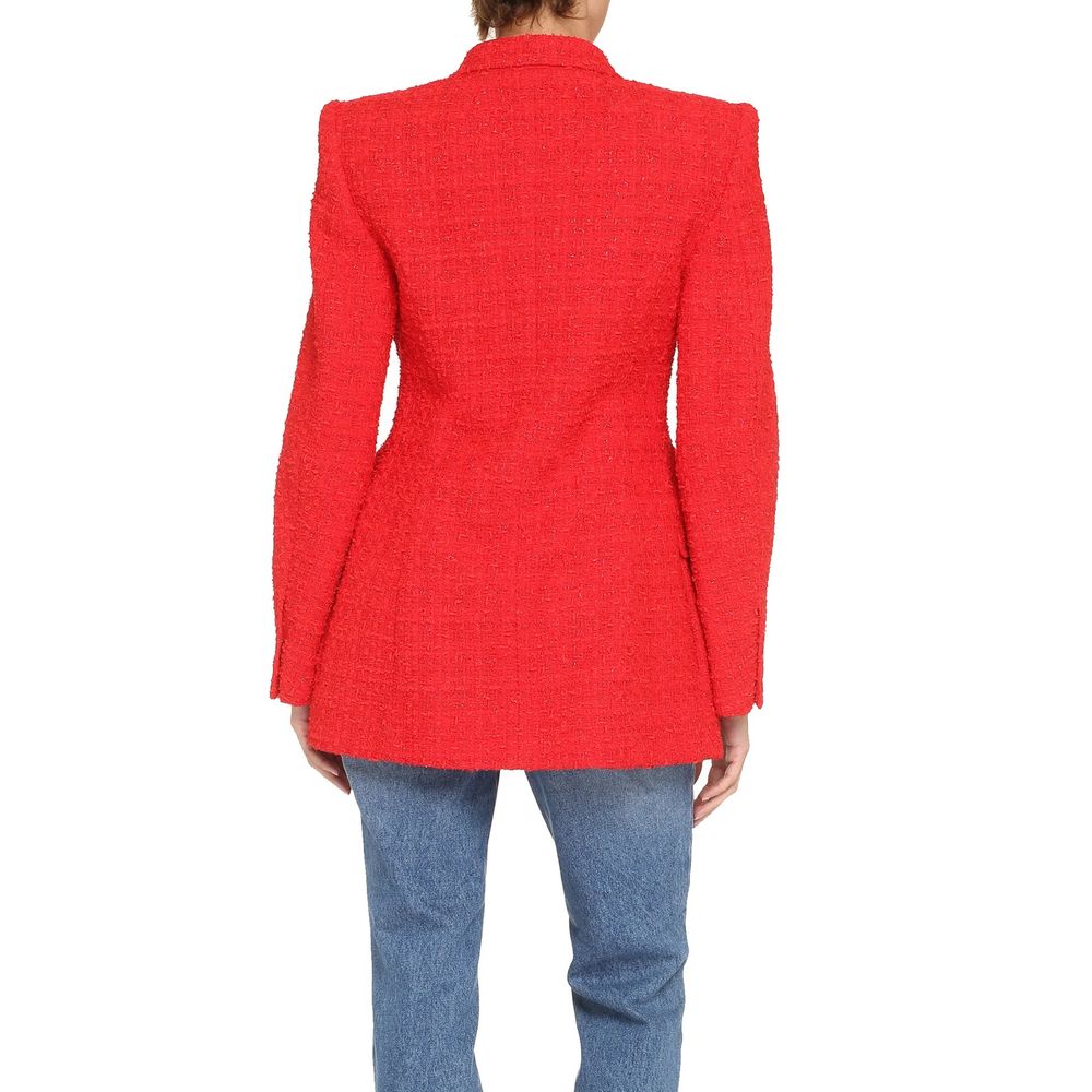 Red cotton blazer by Balenciaga featuring a tailored fit and classic lapel, displayed on a hanger against a neutral background.