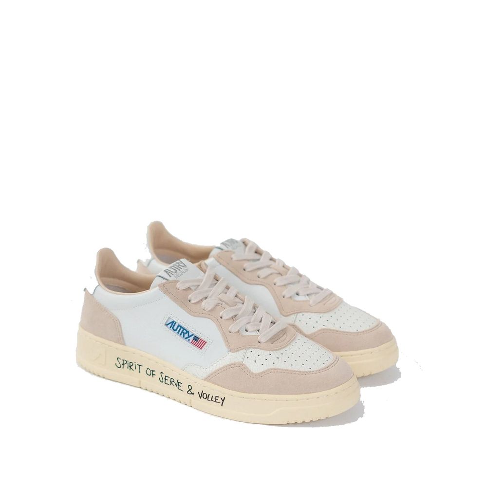 White Autry athletic sneakers made of goatskin leather, featuring a classic sporty design and lace-up closure.