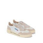 White Autry athletic sneakers made of goatskin leather, featuring a classic sporty design and lace-up closure.