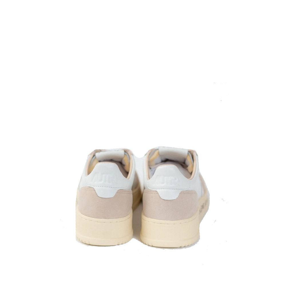 Autry white goatskin athletic sneakers with lace-up design and cushioned soles, stylish and comfortable for casual wear.