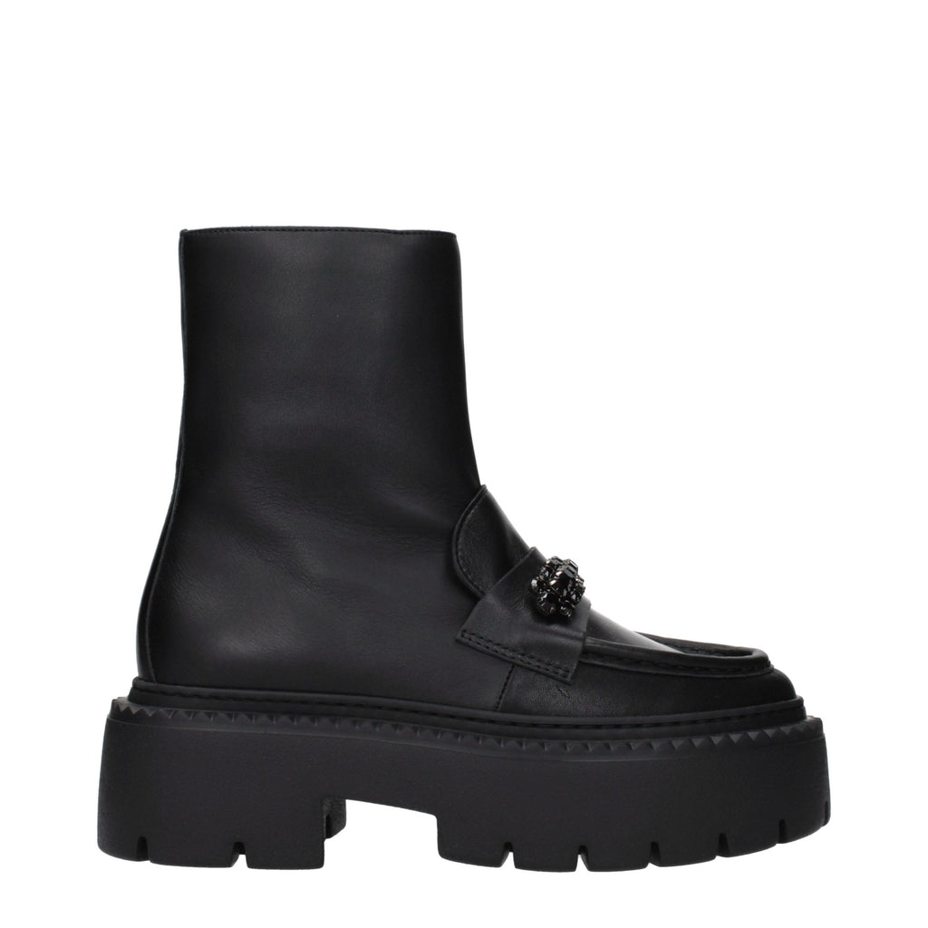 Jimmy Choo black leather ankle boots with sleek design and pointed toes, stylish footwear for versatile fashion looks.