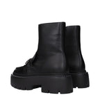 Jimmy Choo black leather ankle boots with sleek design and pointed toes, stylish footwear for women.