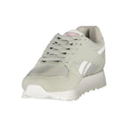 Reebok gray women's sneaker with polyurethane upper, featuring a sleek design and comfortable sole for casual wear.