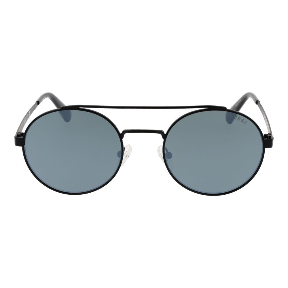 Guess black metal sunglasses with dark lenses and sleek frame, stylish eyewear for a modern look.