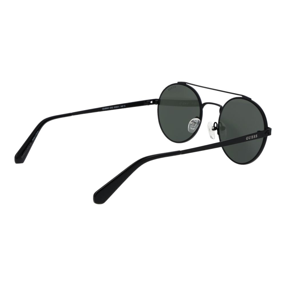 Guess black metal sunglasses with sleek frame and dark tinted lenses, stylish and modern eyewear for fashionable sun protection.