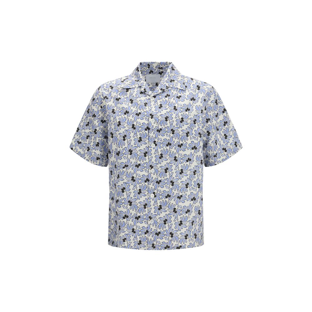 Prada multicolor cotton shirt with vibrant pattern and button-up front, displayed on a hanger.