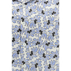 Prada multicolor cotton patterned shirt with vibrant geometric design and classic collar, displayed on a hanger.