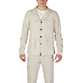 Beige linen blazer from In My Hood, tailored fit, with classic lapels and button details, styled on a model.