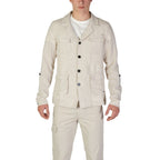 Beige linen blazer from In My Hood, tailored fit, with classic lapels and button details, styled on a model.