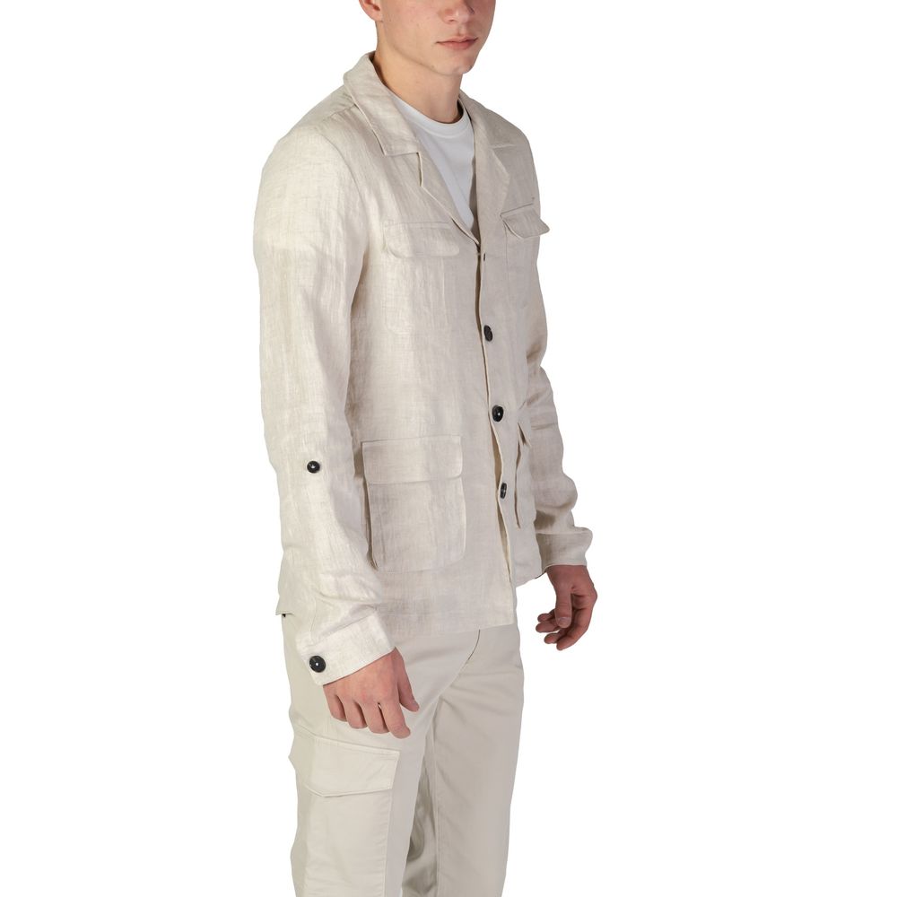 Beige linen blazer from In My Hood featuring a tailored fit and classic lapel, styled on a model.