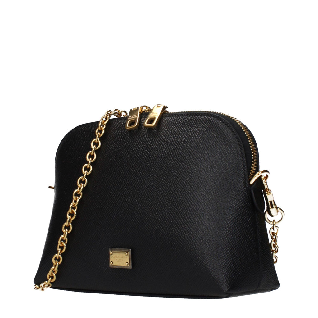 Black leather Dolce & Gabbana shoulder bag with gold-tone hardware and adjustable strap, stylish and elegant for everyday wear.