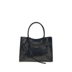 Black Balenciaga Lamb Ovis Aries shoulder bag with sleek design and subtle branding, featuring a shoulder strap and structured silhouette.