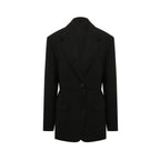 Prada black wool blazer with tailored fit, notched lapel, and button closure, displayed on a hanger.
