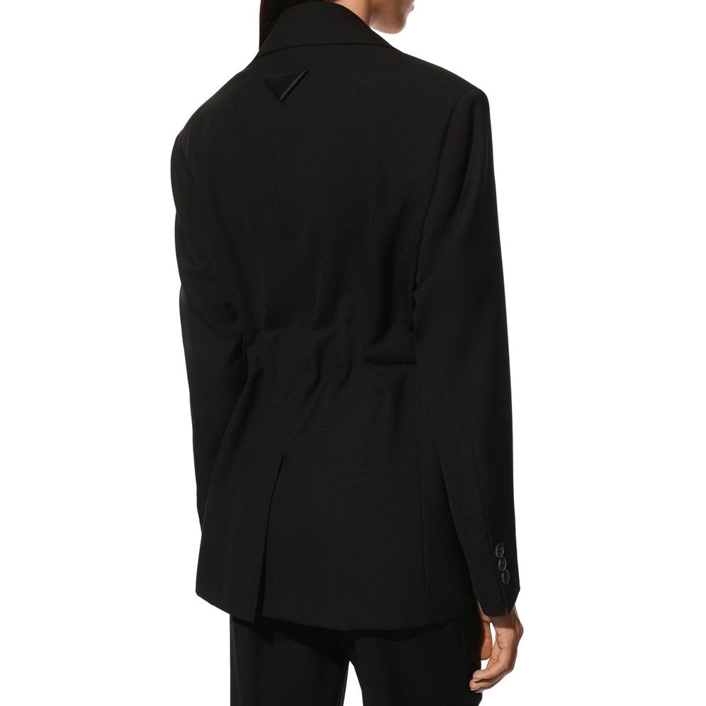 Prada black wool blazer with tailored fit, notch lapel, and sleek design, ideal for formal or business wear.