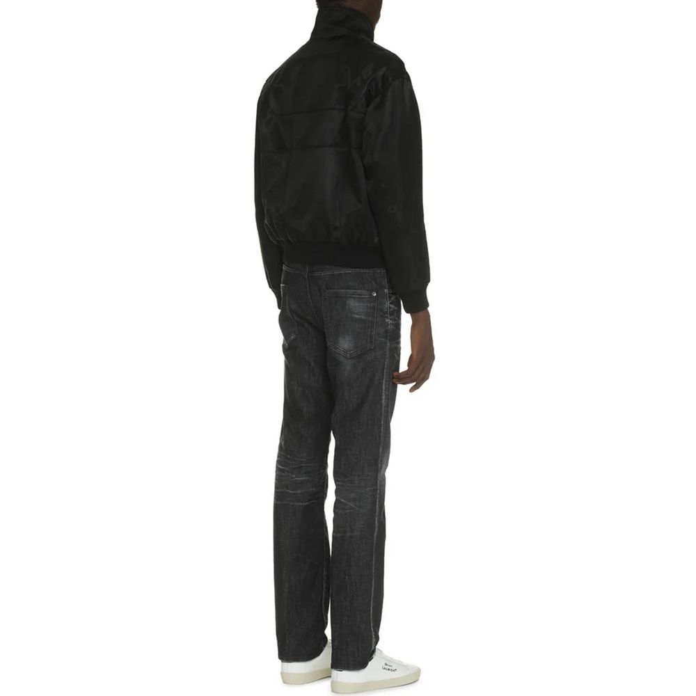 Saint Laurent black silk bomber jacket with a sleek, shiny finish and modern design, displayed on a plain background.