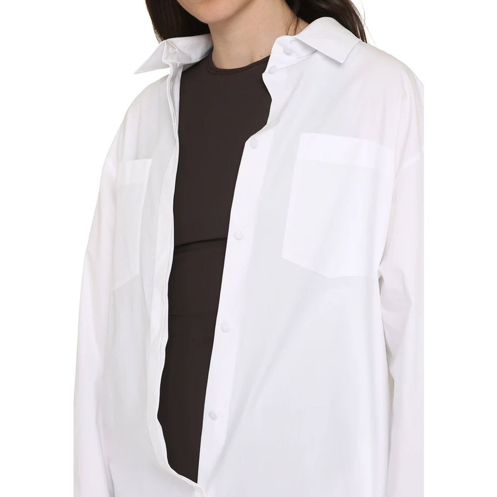 White cotton dress shirt by Valentino Garavani featuring a classic collar and button-down front.