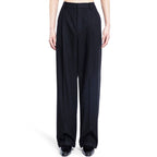 Saint Laurent black cashmere casual pants displayed on a model, showcasing soft fabric and relaxed fit.