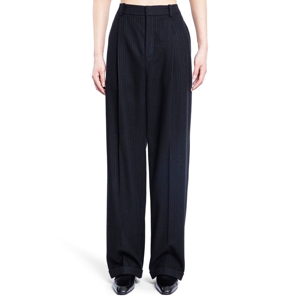 Saint Laurent black cashmere casual pants displayed on a model, showcasing soft fabric and relaxed fit.