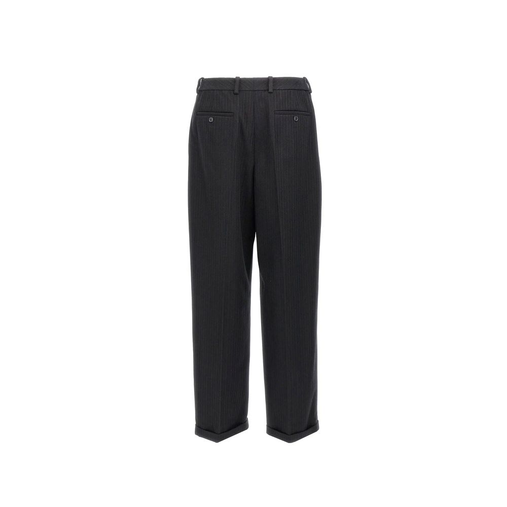 Saint Laurent black cashmere casual pants, soft and stylish, shown on a model with a relaxed fit and tailored design.