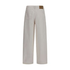 Ami Paris white cotton denim jeans with classic five-pocket design and straight-leg fit, displayed on a hanger.