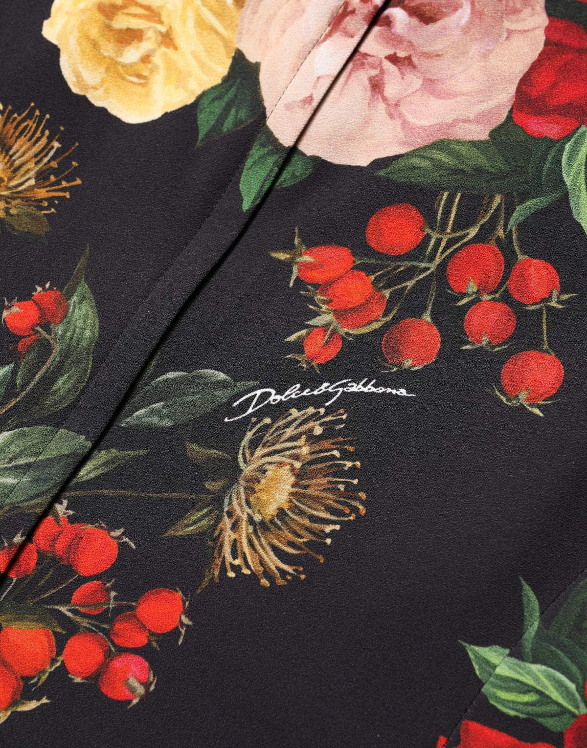 Dolce & Gabbana black floral crepe blouse with frill detail, showcasing elegant long sleeves and intricate floral pattern.