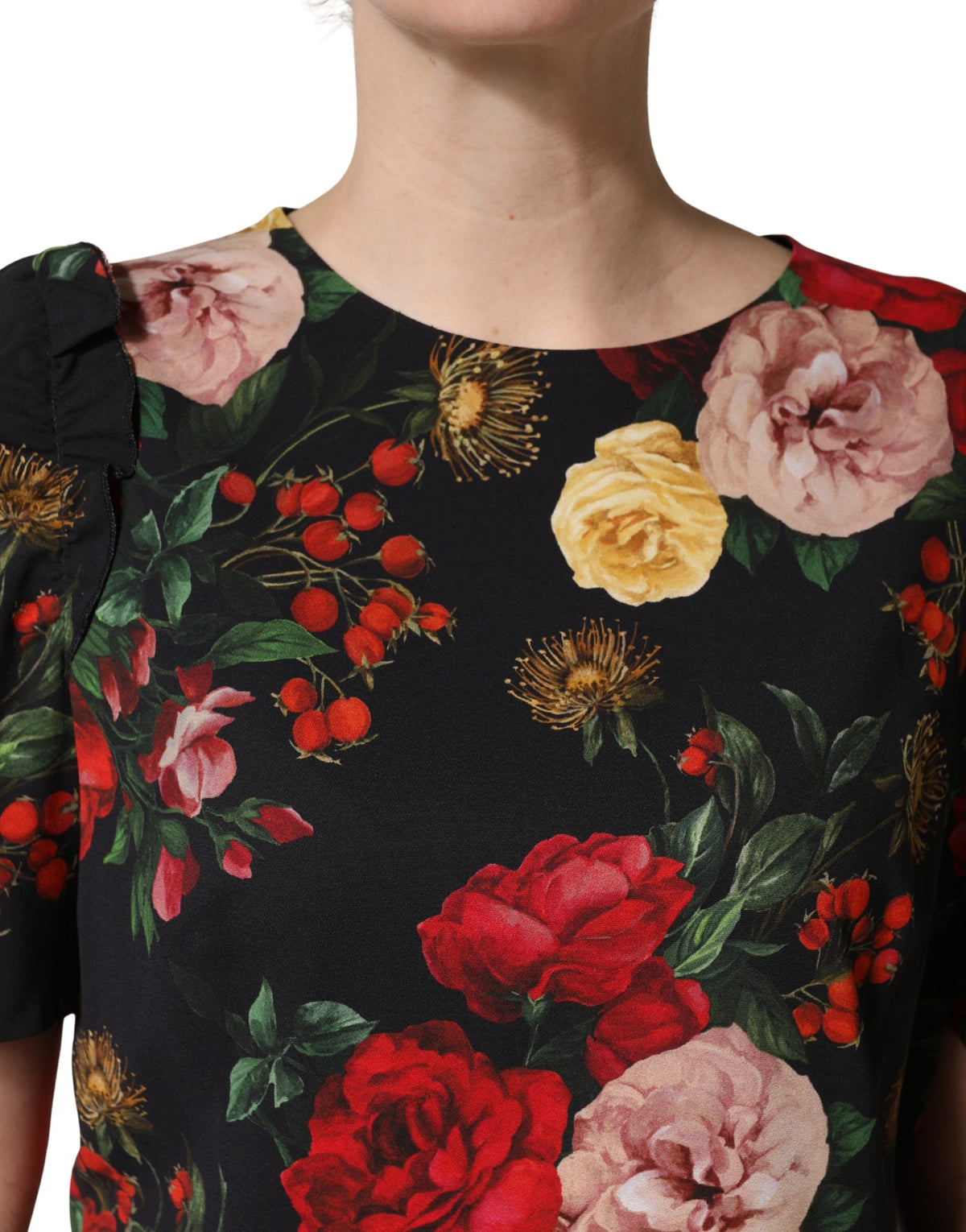Dolce & Gabbana black floral crepe blouse with frill details, stylish top featuring elegant floral pattern and feminine design.