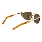 GCDS gold metal sunglasses with stylish frame and tinted lenses, fashionable eyewear accessory.