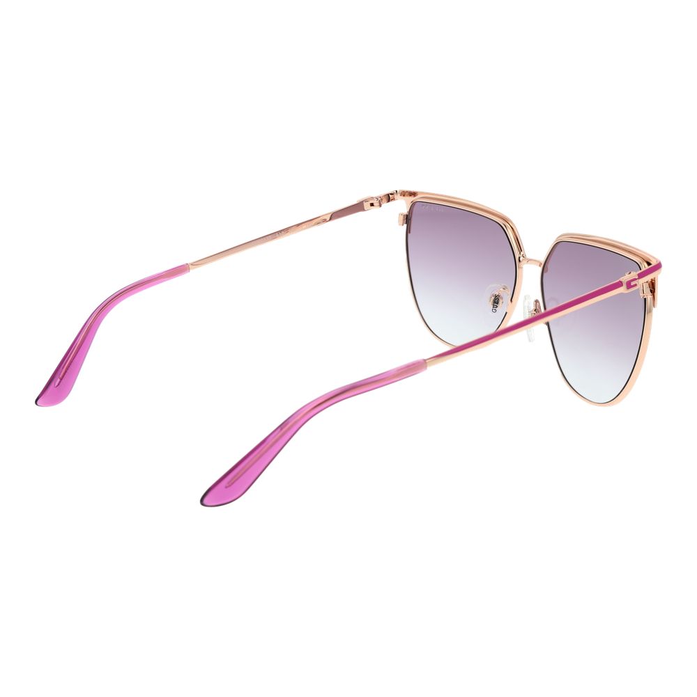 Guess rose gold metal sunglasses with round frames and tinted lenses, stylish accessory for sun protection and fashion.
