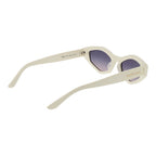Marciano by Guess white plastic sunglasses with round frames and dark tinted lenses on a plain background.