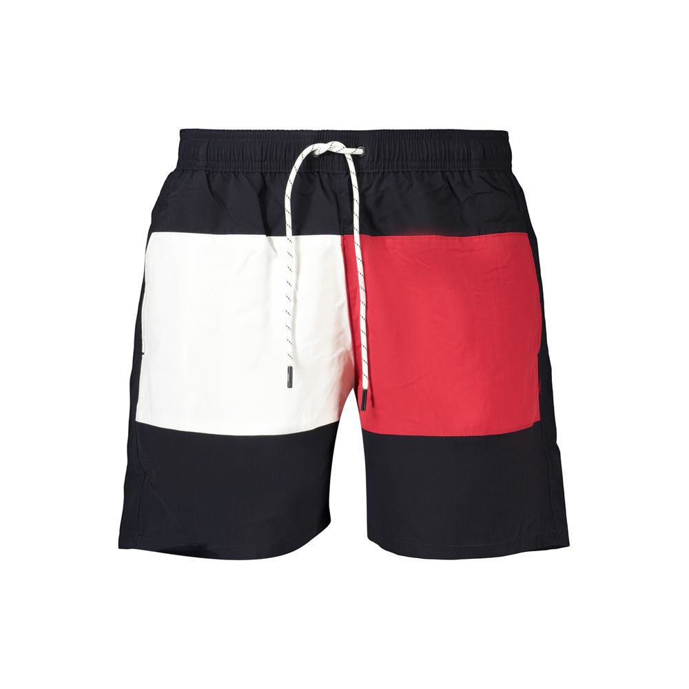 Tommy Hilfiger blue polyester men's swimwear with adjustable waistband and side pockets, designed for swimming and beachwear.