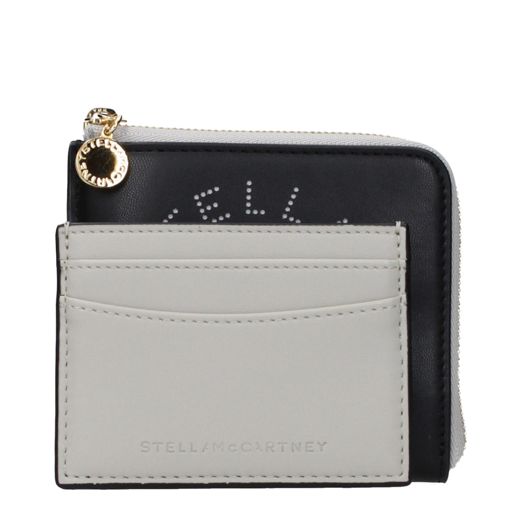 Black leather wallet by Stella McCartney with sleek design and multiple card slots, featuring the brand's logo.