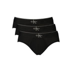 Black cotton men's underwear by Calvin Klein with a snug fit and branded waistband, displayed on a neutral background.