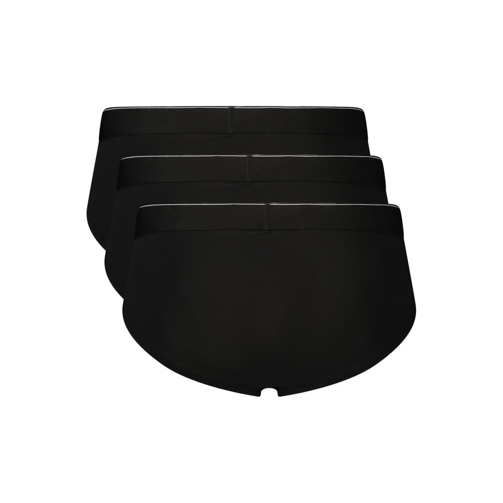 Black cotton men's underwear by Calvin Klein, featuring a close-up of the waistband and fabric texture.