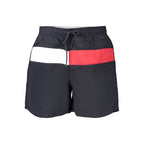 Tommy Hilfiger blue polyester men's swimwear featuring a classic design and adjustable waistband for comfortable fit.