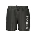 Calvin Klein men's black polyester shorts with an elastic waistband and side pockets, casual and comfortable for everyday wear.