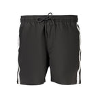 Calvin Klein men's boxer shorts in black polyester, featuring a comfortable waistband and classic design.