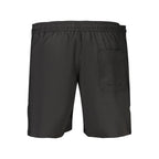 Calvin Klein Nero polyester men's boxer shorts with a sleek black design and comfortable fit, shown on a model.