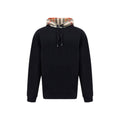 Black cotton sweatshirt by Burberry with subtle branding and a relaxed fit, displayed on a neutral background.