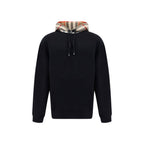 Black cotton sweatshirt by Burberry with subtle branding and a relaxed fit, displayed on a neutral background.