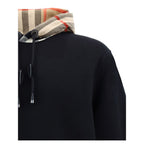 Black cotton sweatshirt by Burberry with subtle logo detail, casual fit, and classic style.