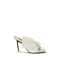 Givenchy white lamb Ovis Aries mules with pointed toes and sleek design, perfect for elegant casual or formal wear.