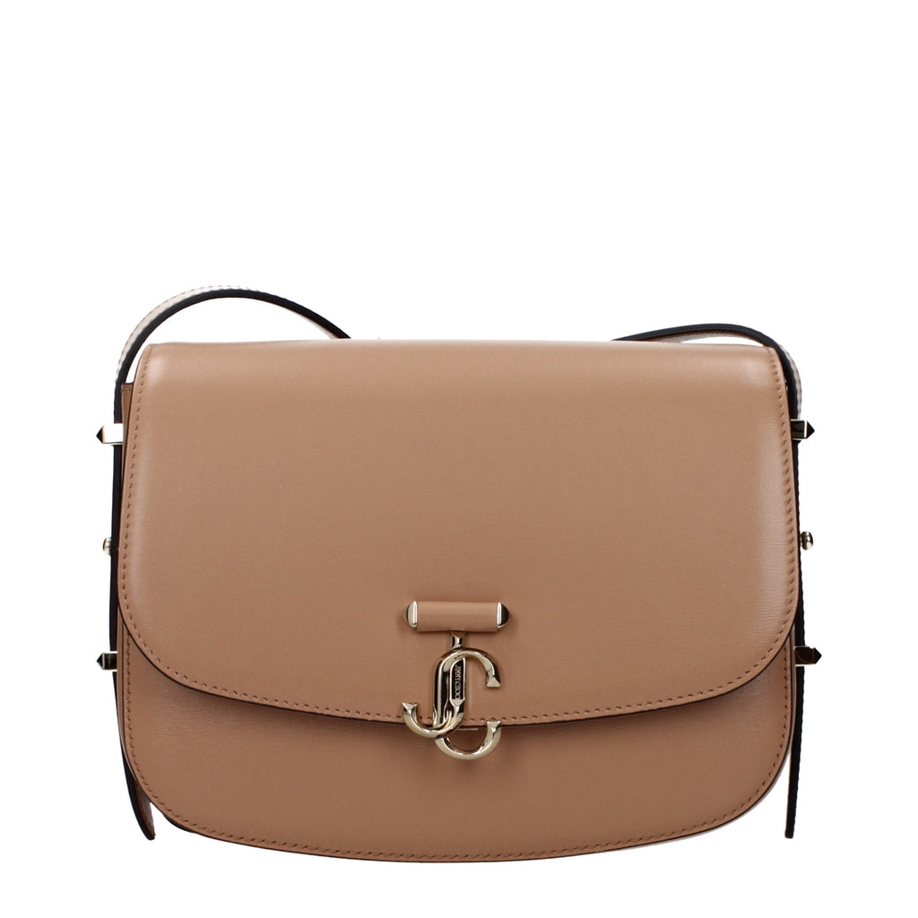 Jimmy Choo brown leather crossbody bag with sleek design and adjustable strap, featuring subtle branding and elegant craftsmanship.