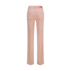 Chloé multicolor cotton straight-leg jeans with vibrant patchwork and classic five-pocket design, displayed on a hanger.