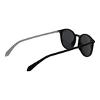 Polaroid black polycarbonate sunglasses with sleek frame and tinted lenses, designed for stylish eye protection.