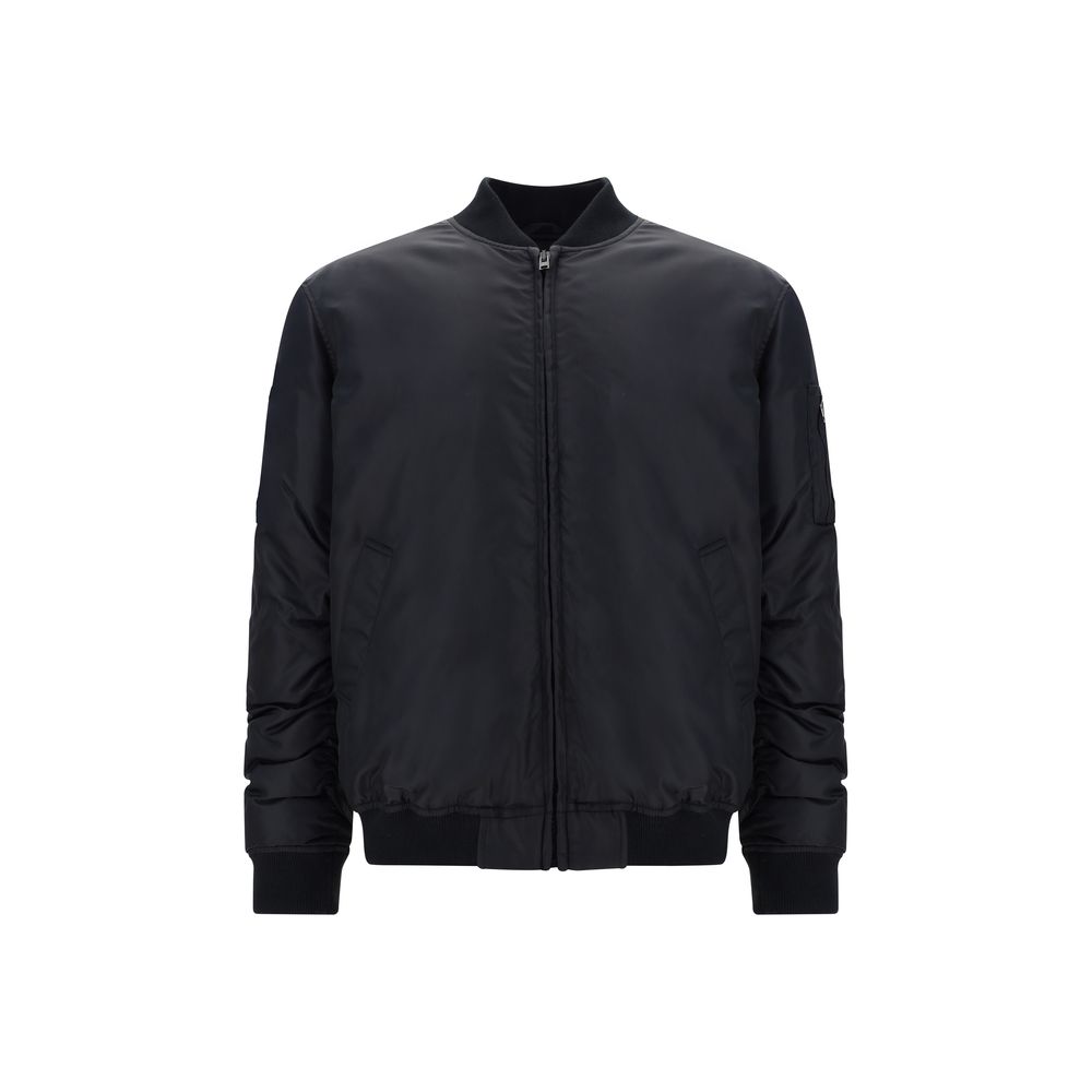 Moschino black polyamide bomber jacket with a sleek design and zipper details, displayed on a hanger.