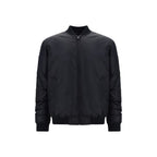 Moschino black polyamide bomber jacket with a sleek design and zipper details, displayed on a hanger.