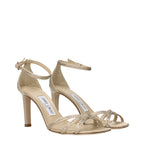 Jimmy Choo beige satin stiletto heel sandals with open toe and ankle strap, elegant footwear for formal occasions.